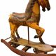 Ancient wooden rocking horse with original paint, hand-carved.
