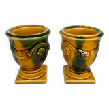 Pair of ocher and green ceramic point-a-line candlesticks