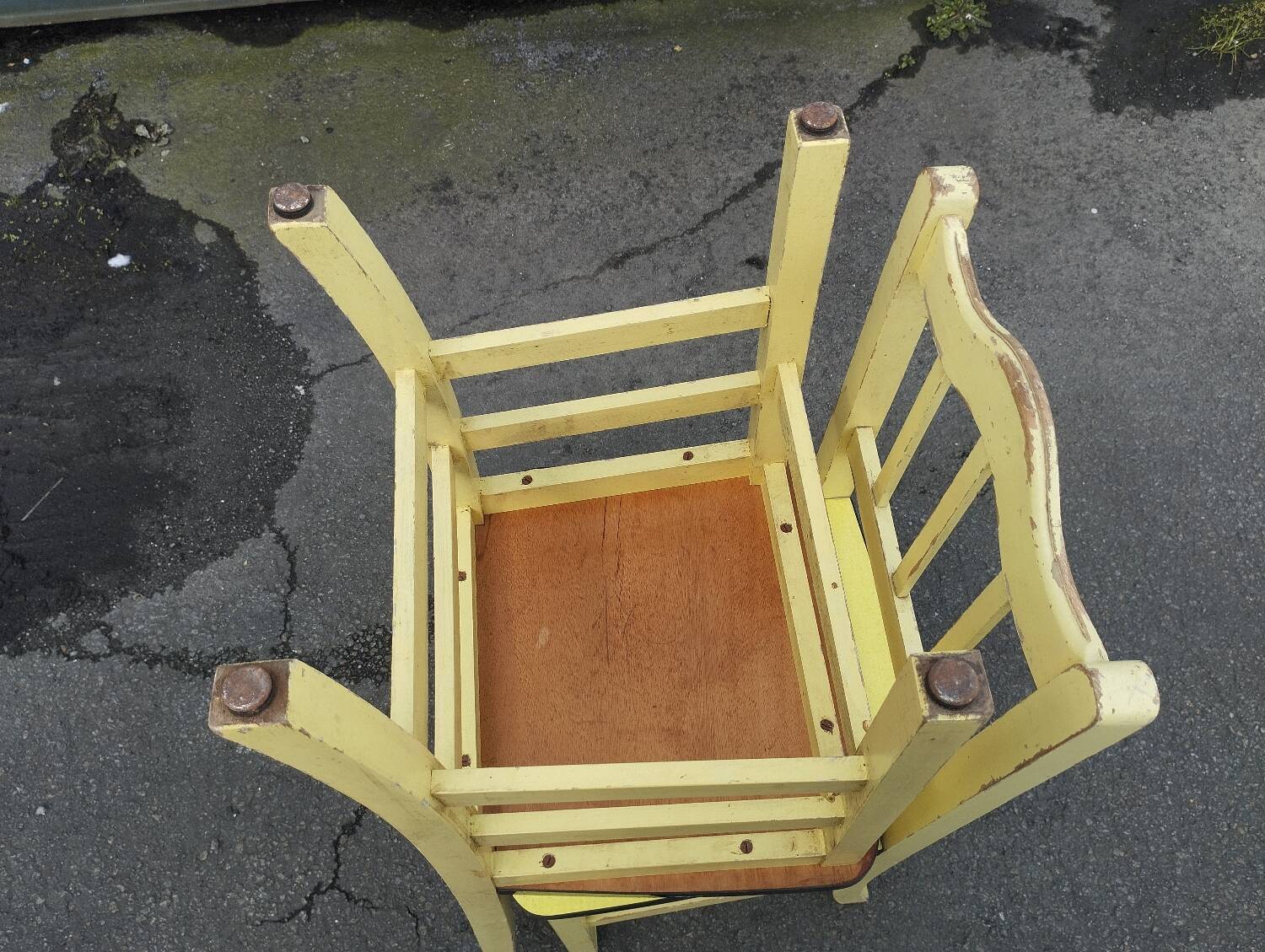 Pair of wooden and yellow formica chairs