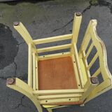 Pair of wooden and yellow formica chairs
