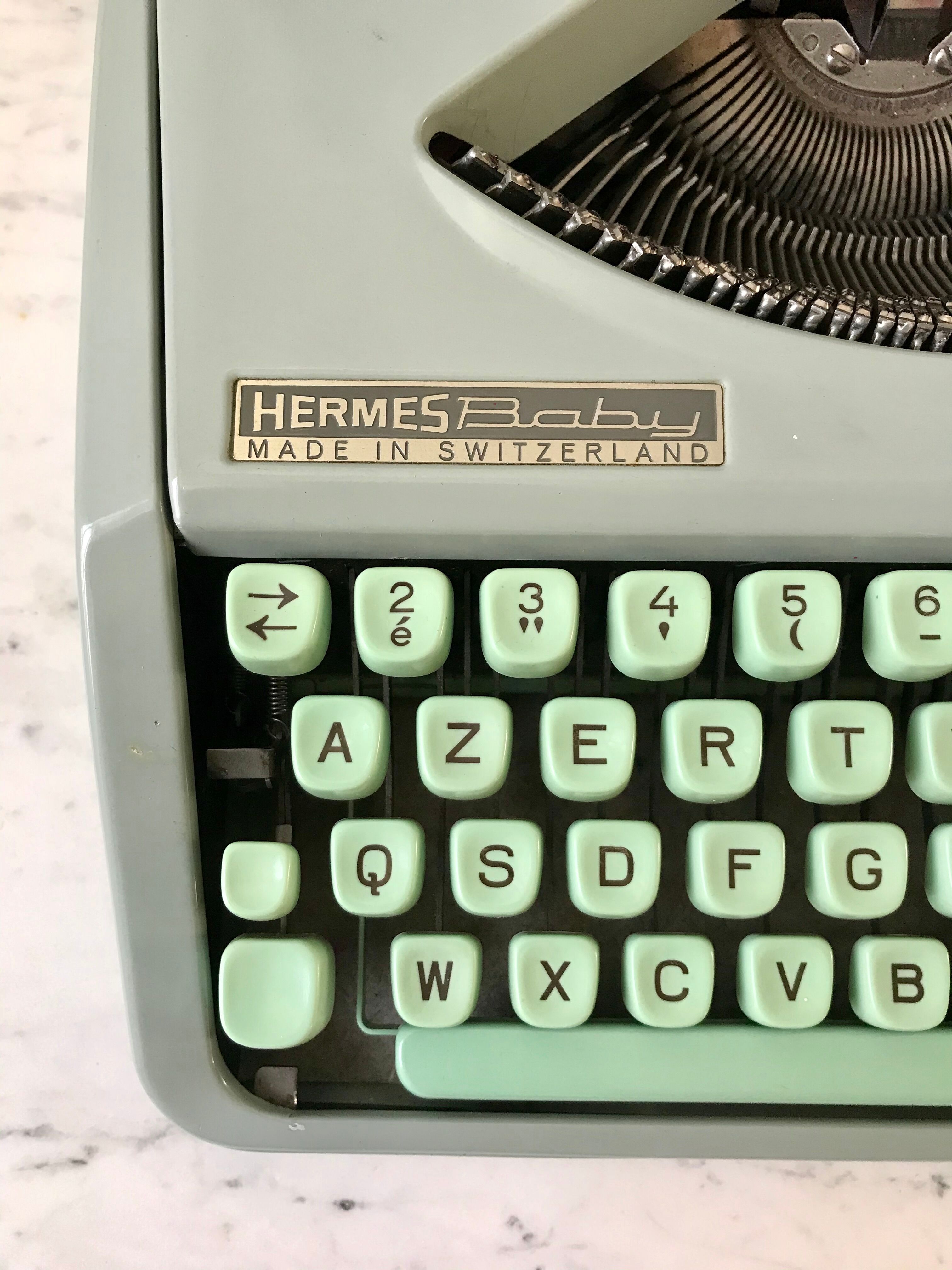 Mint green typewriter hermes baby made in switzerland