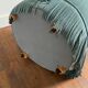 Velvet upholstered pouf