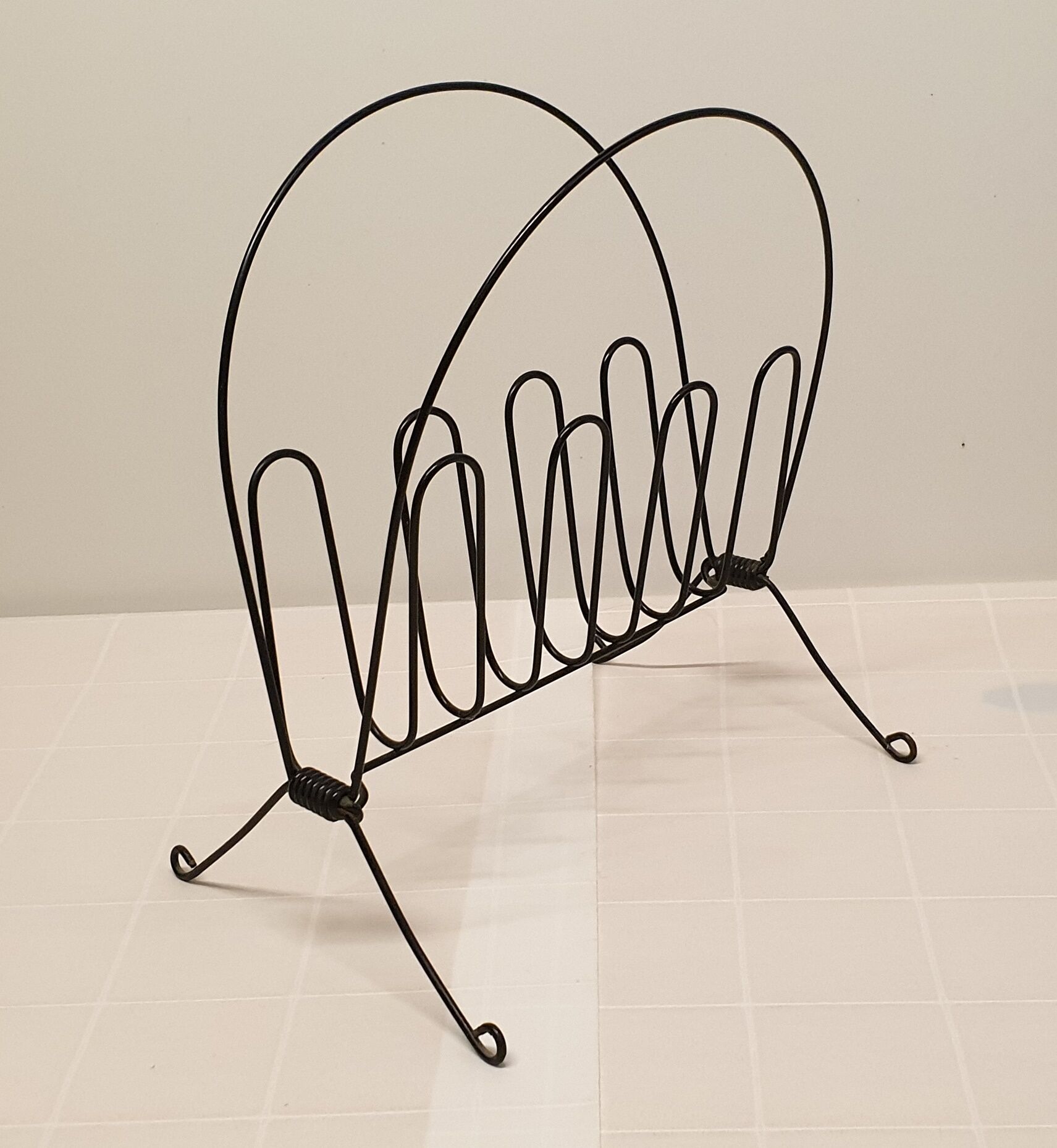 Vintage laminated metal magazine rack