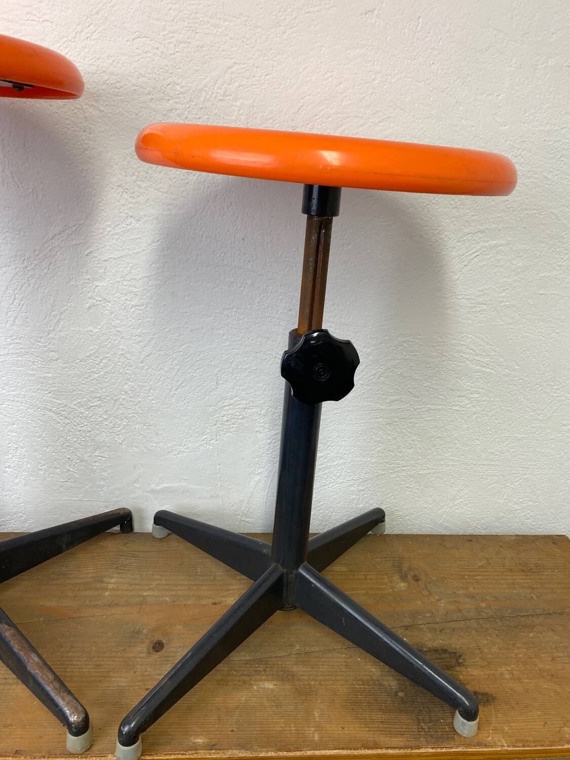 Two vintage industrial stools