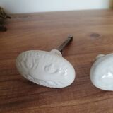 Set of two white painted cast iron door handles