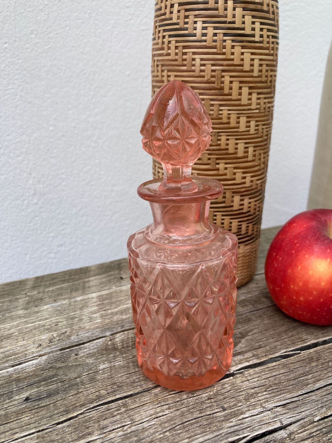Art Deco perfume bottle in old amber pink glass