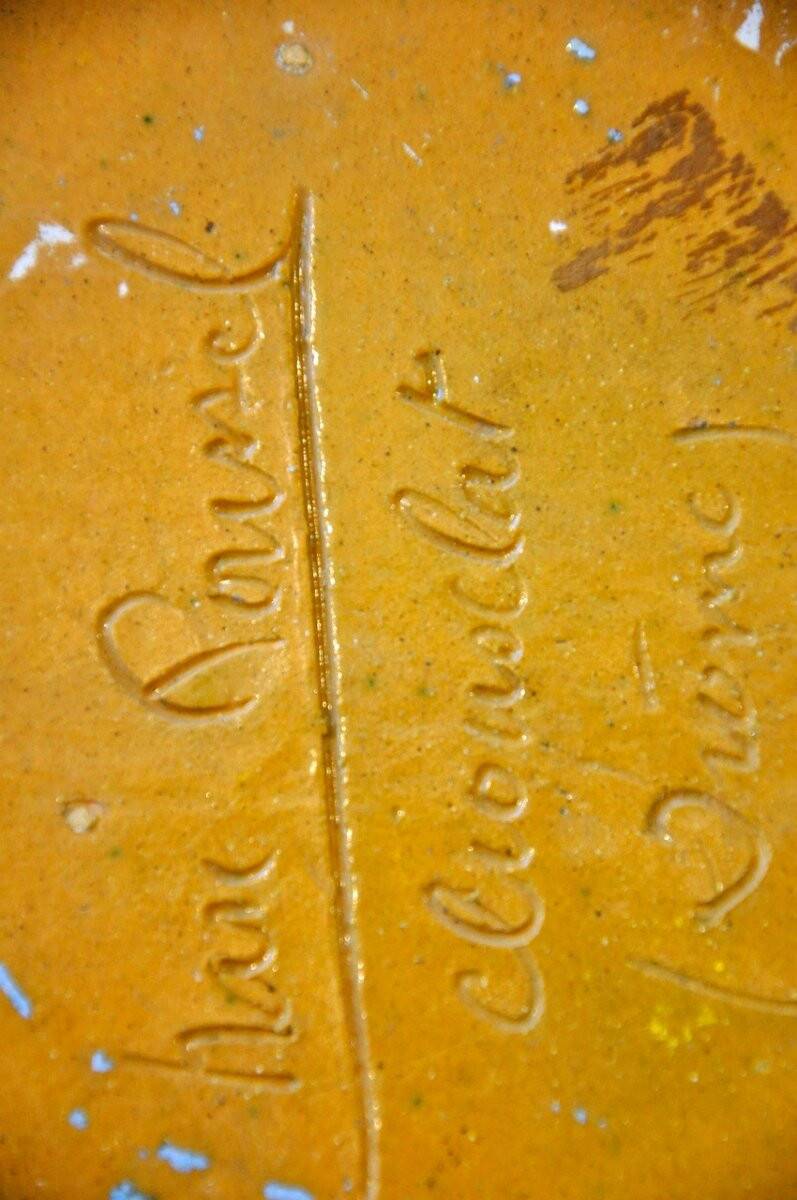 Ceramic dish signed Marc Roussel representing a sailboat, 20th century period