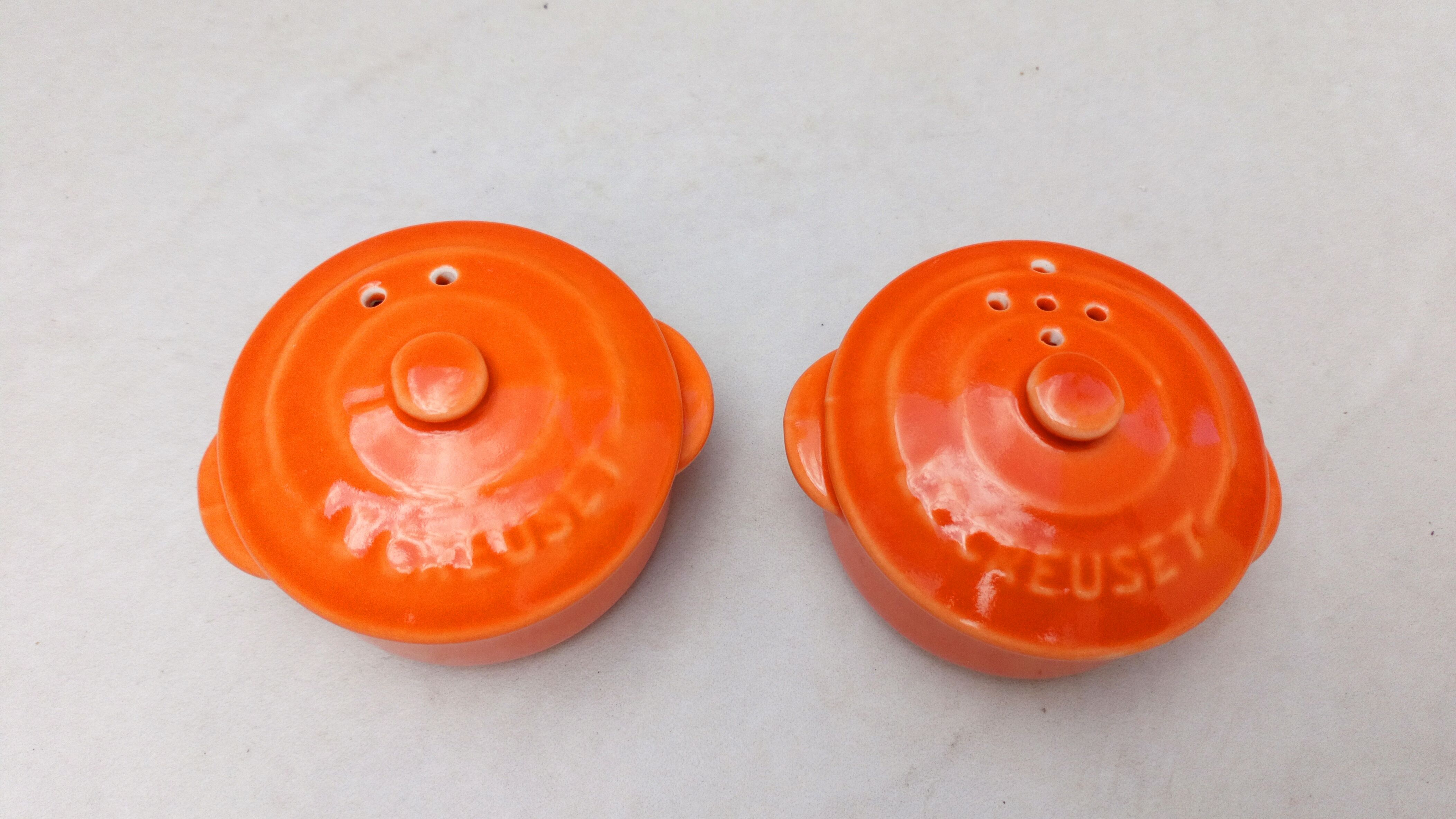 Le Creuset salt and pepper shakers