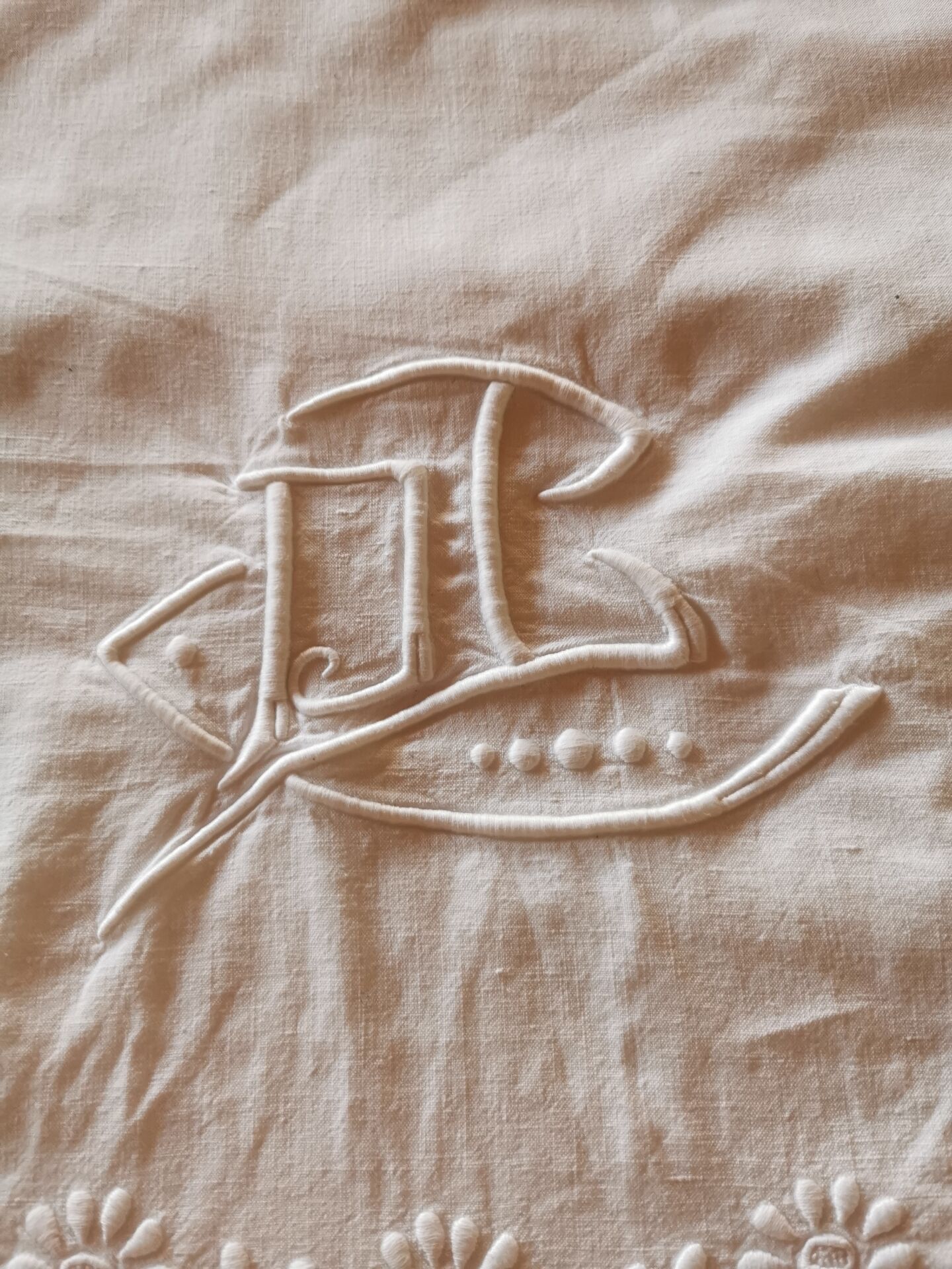 Old monogrammed fabric