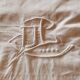 Old monogrammed fabric