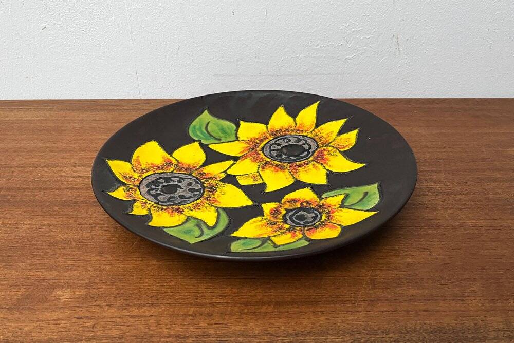 Mid-century German studio pottery wall plate with Ruscha sunflower motif, 1960s.