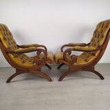 Pair of padded Chesterfield armchairs