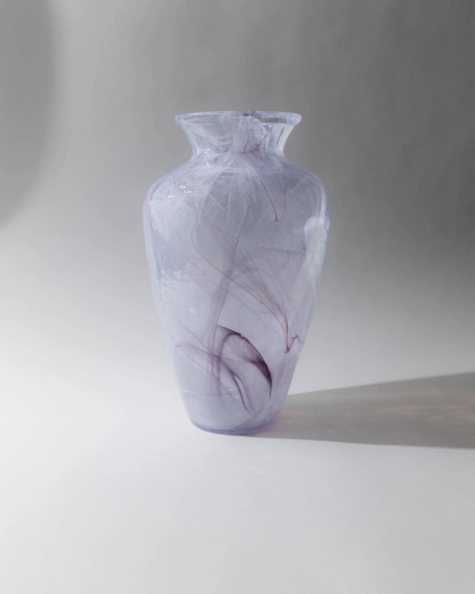 Vintage Murano glass vase from the 1970s, lilac and white swirl.