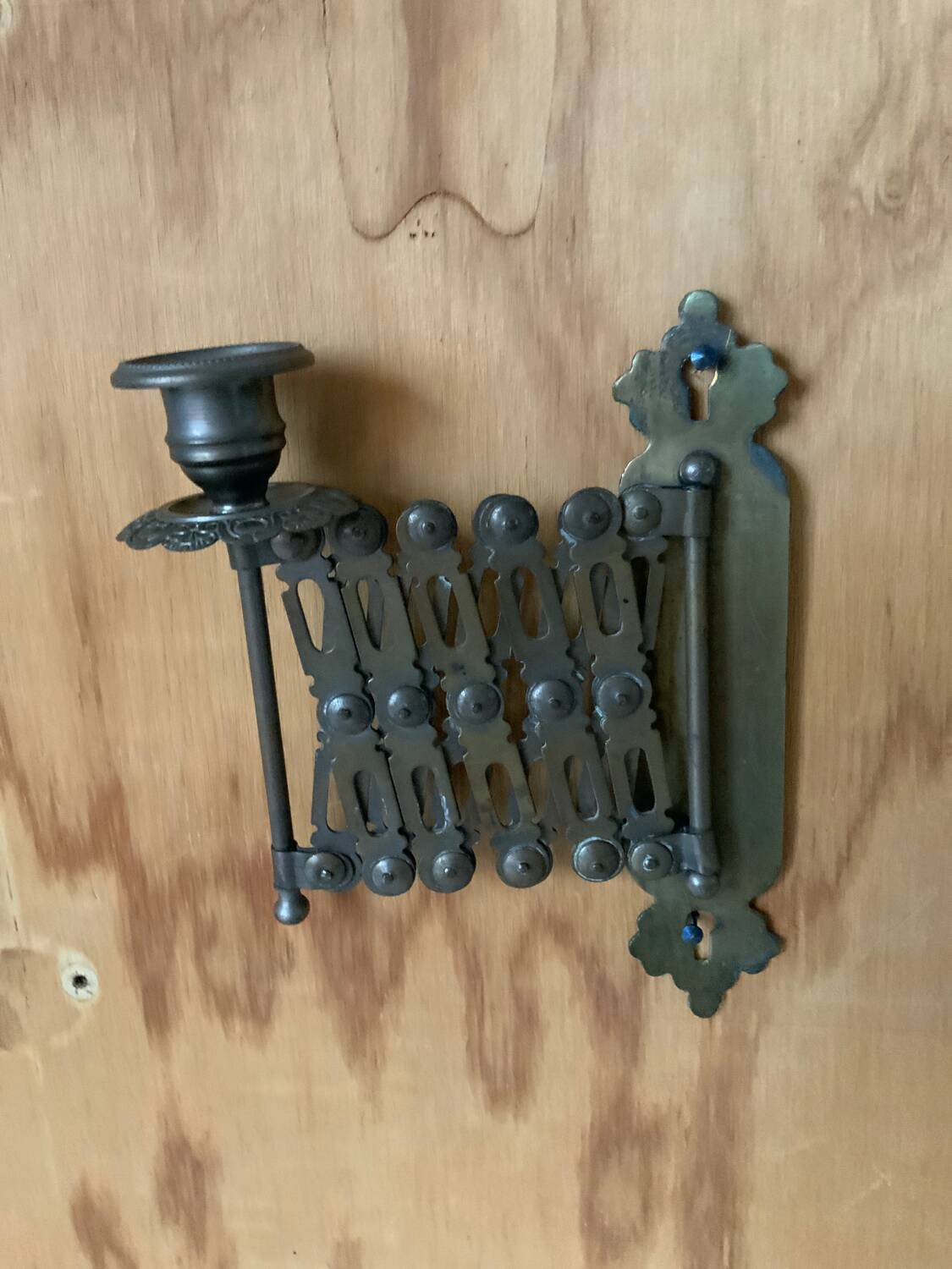 Accordion brass candle holder