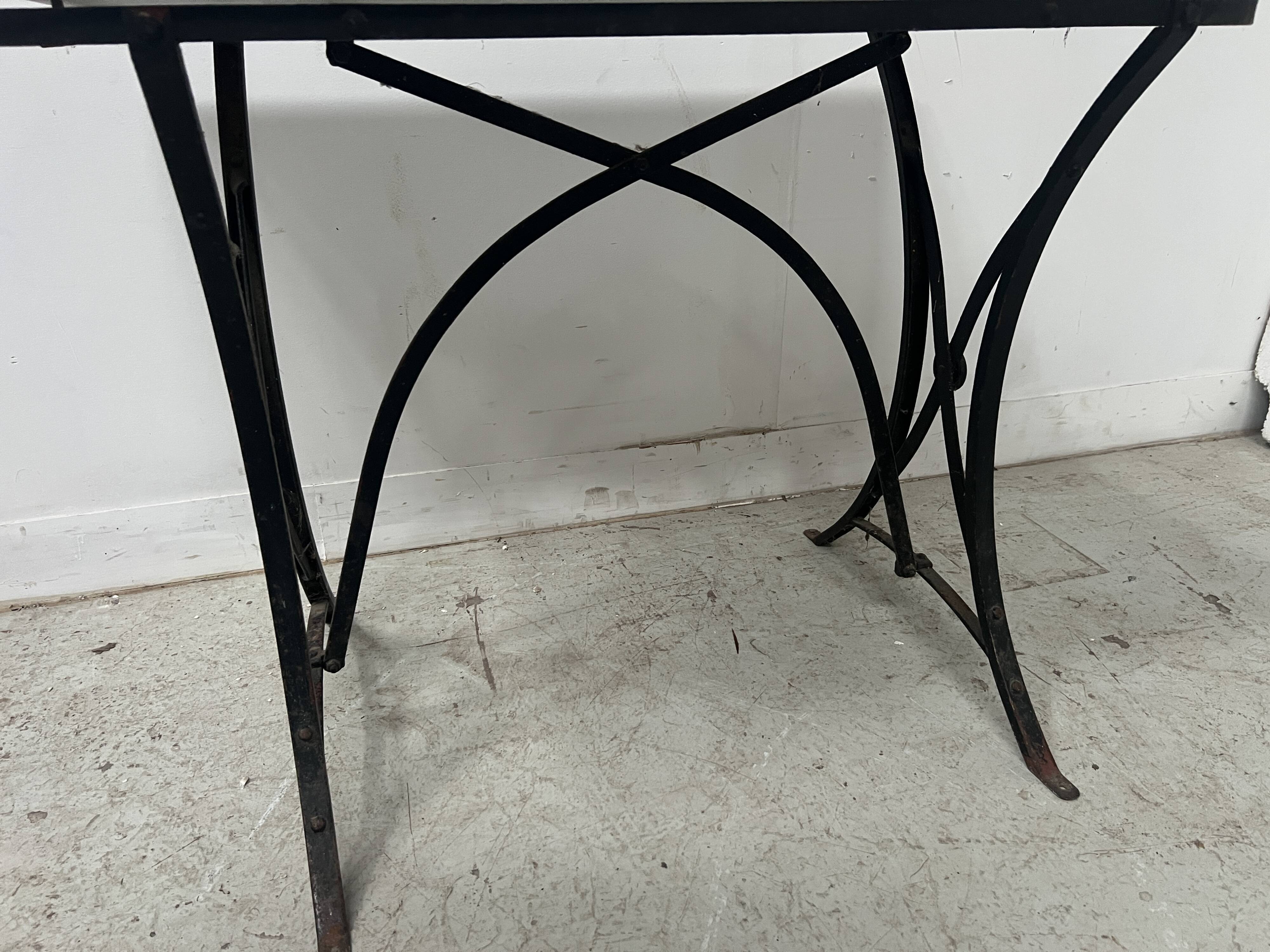 Garden table or veranda in cast iron from the 20th century.