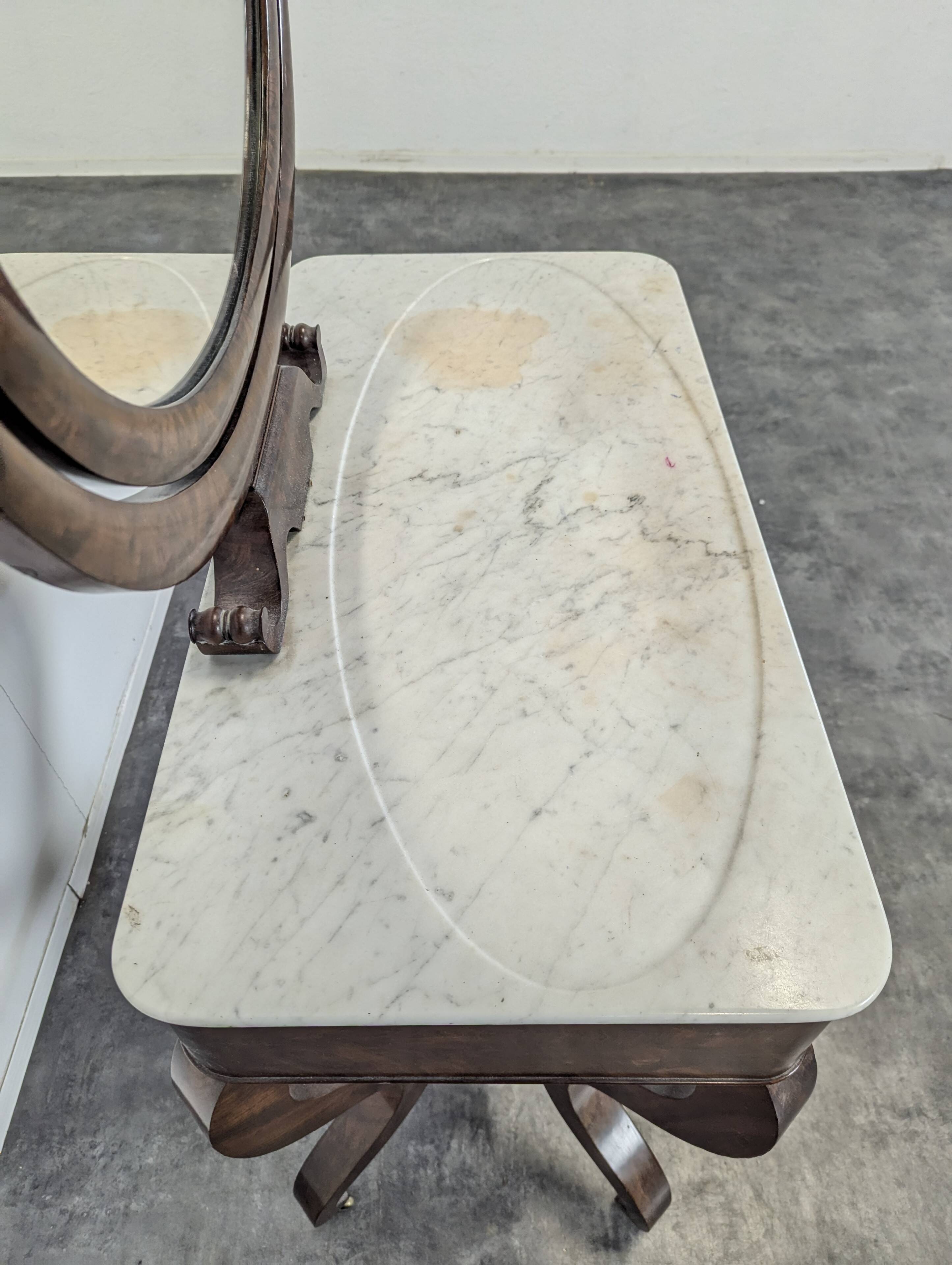 Restoration period flamed mahogany swan neck dressing table