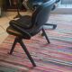 Two black leather armchairs