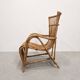 Vintage armchair from the 70s in natural rattan.