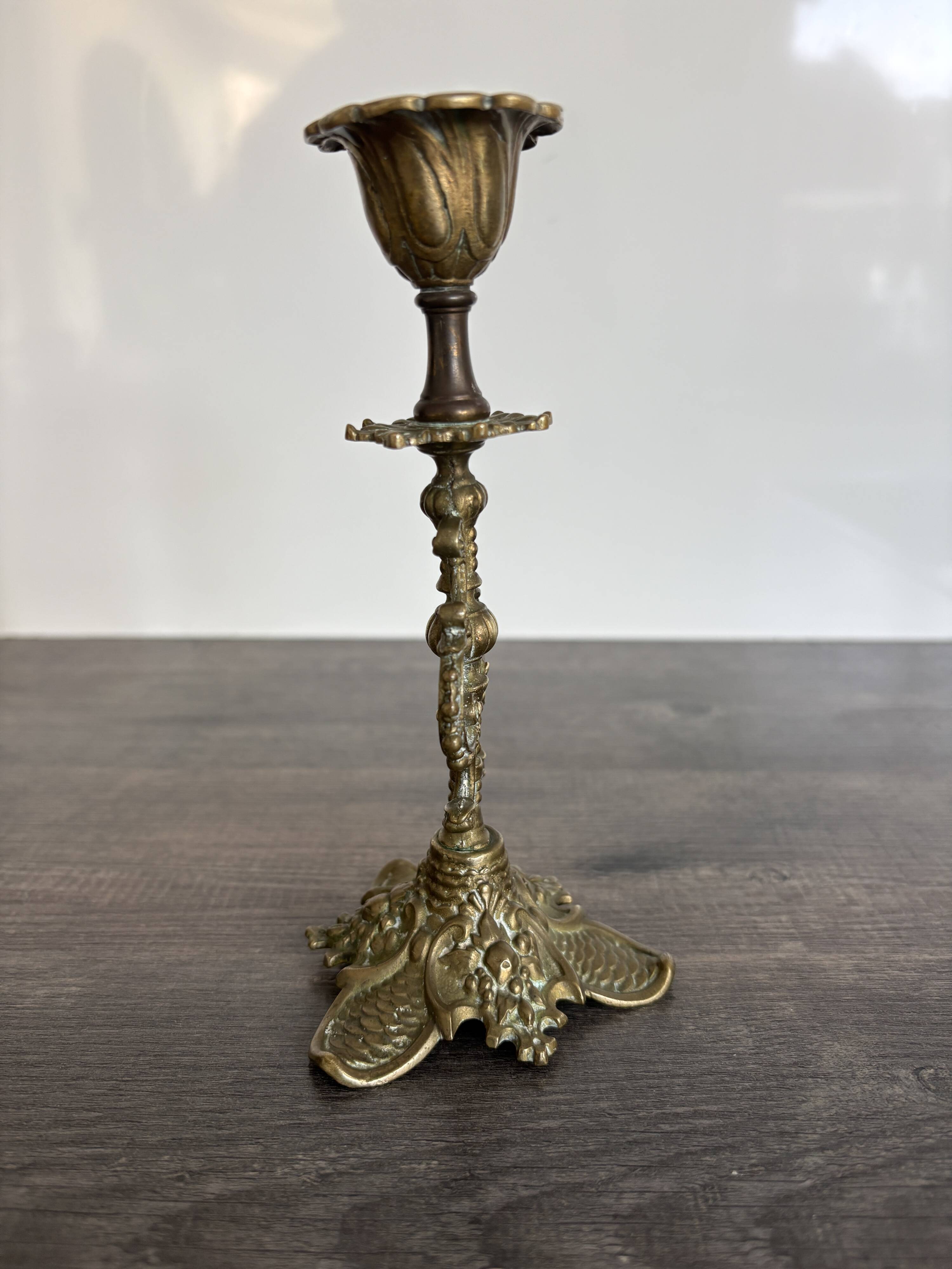 Antique chiselled bronze candlestick