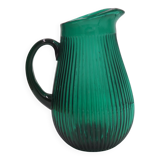 Transparent blue ribbed water jug