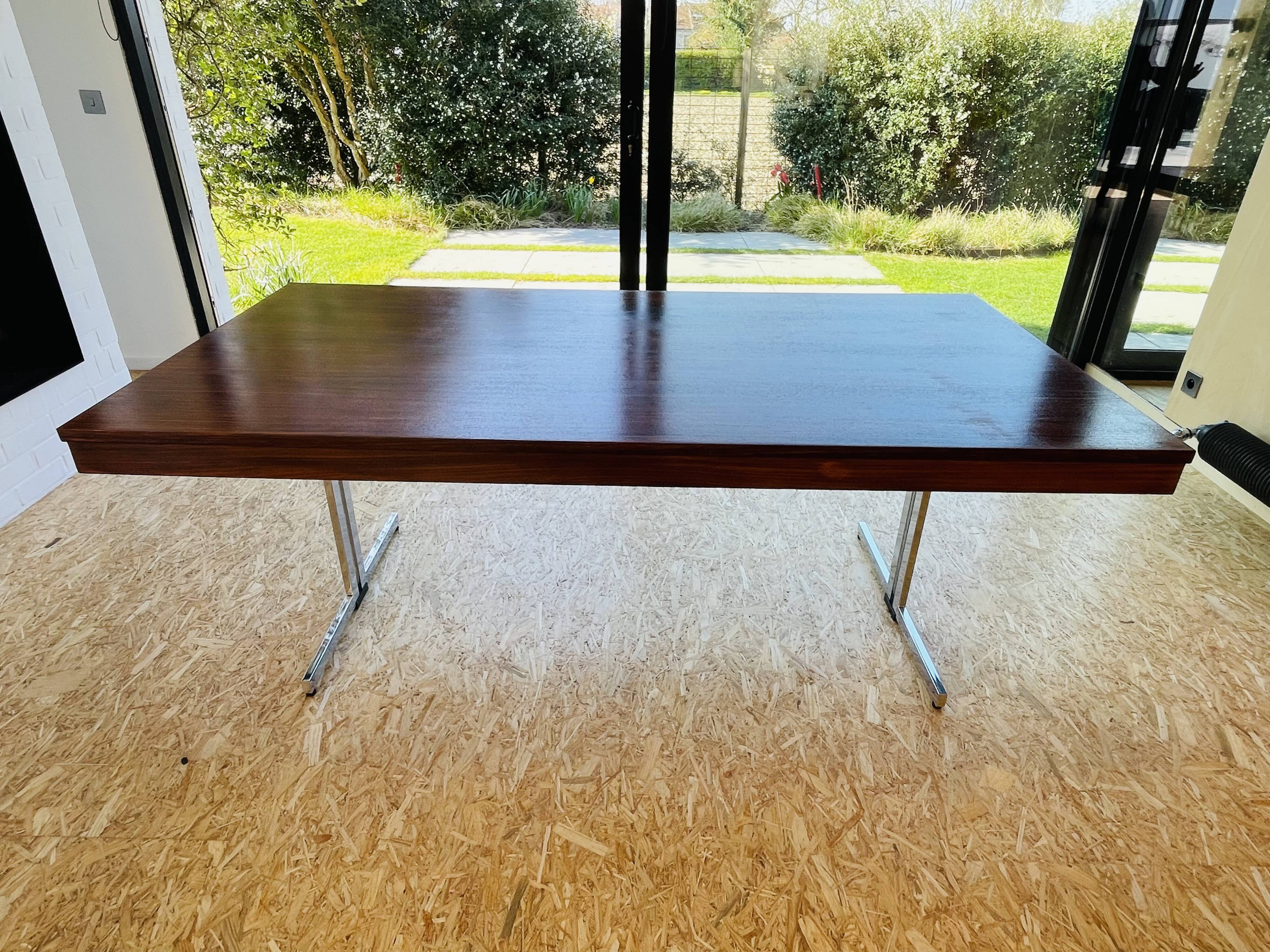 Desk that can serve as a dining table.