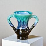 Ancient amphora vase in turquoise glazed stoneware.