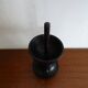Ostrich egg on blackened wooden base - object of curiosity