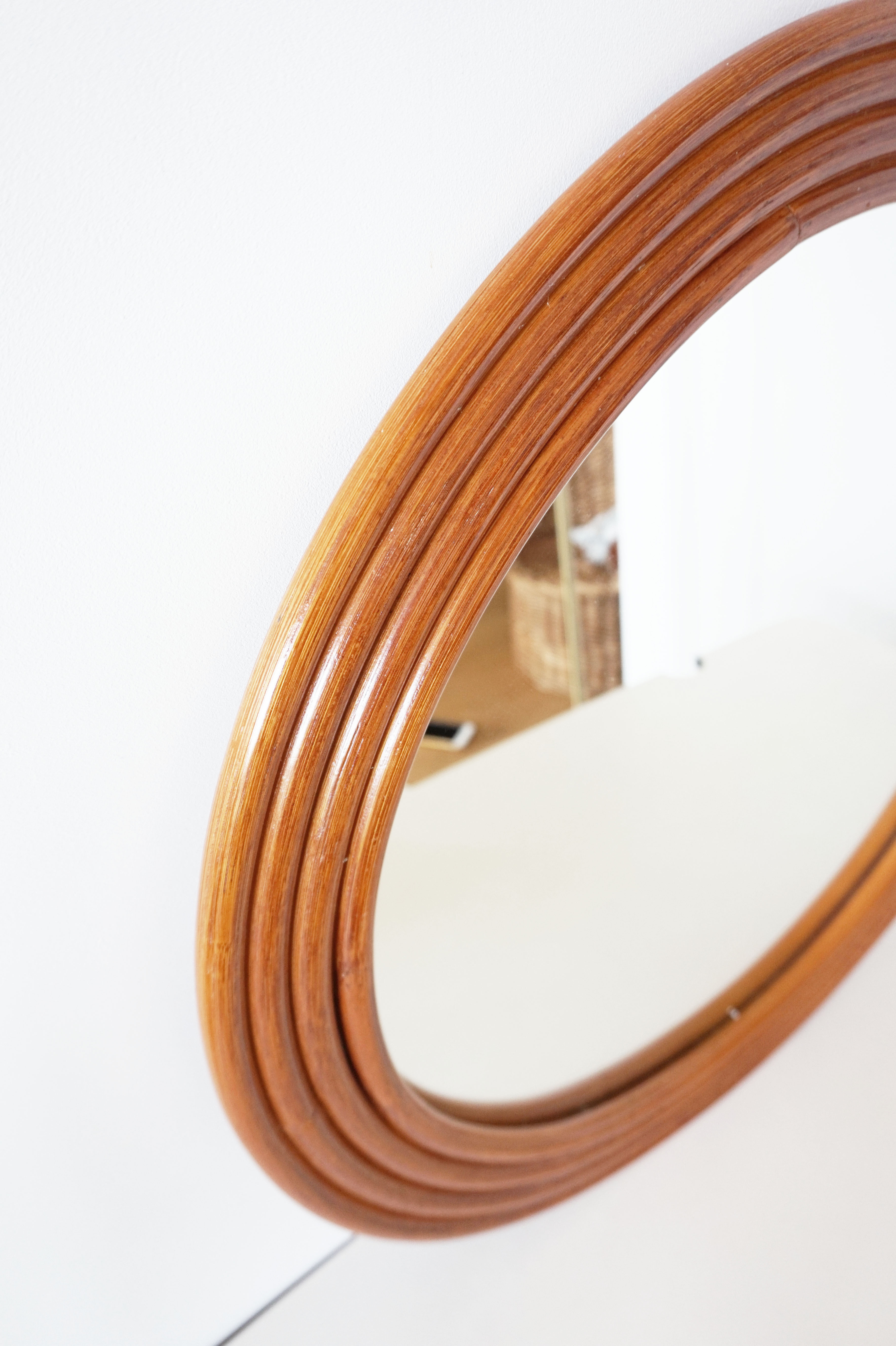 Round mirror in vintage rattan bamboo