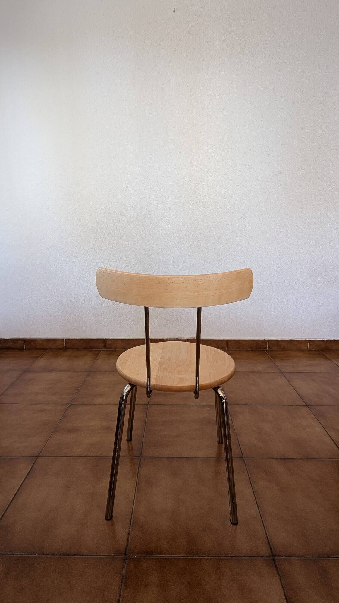 Set of 4 vintage/restored 70s/80s wooden and chrome bistro chairs.