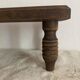 Low stool, turned wooden legs.