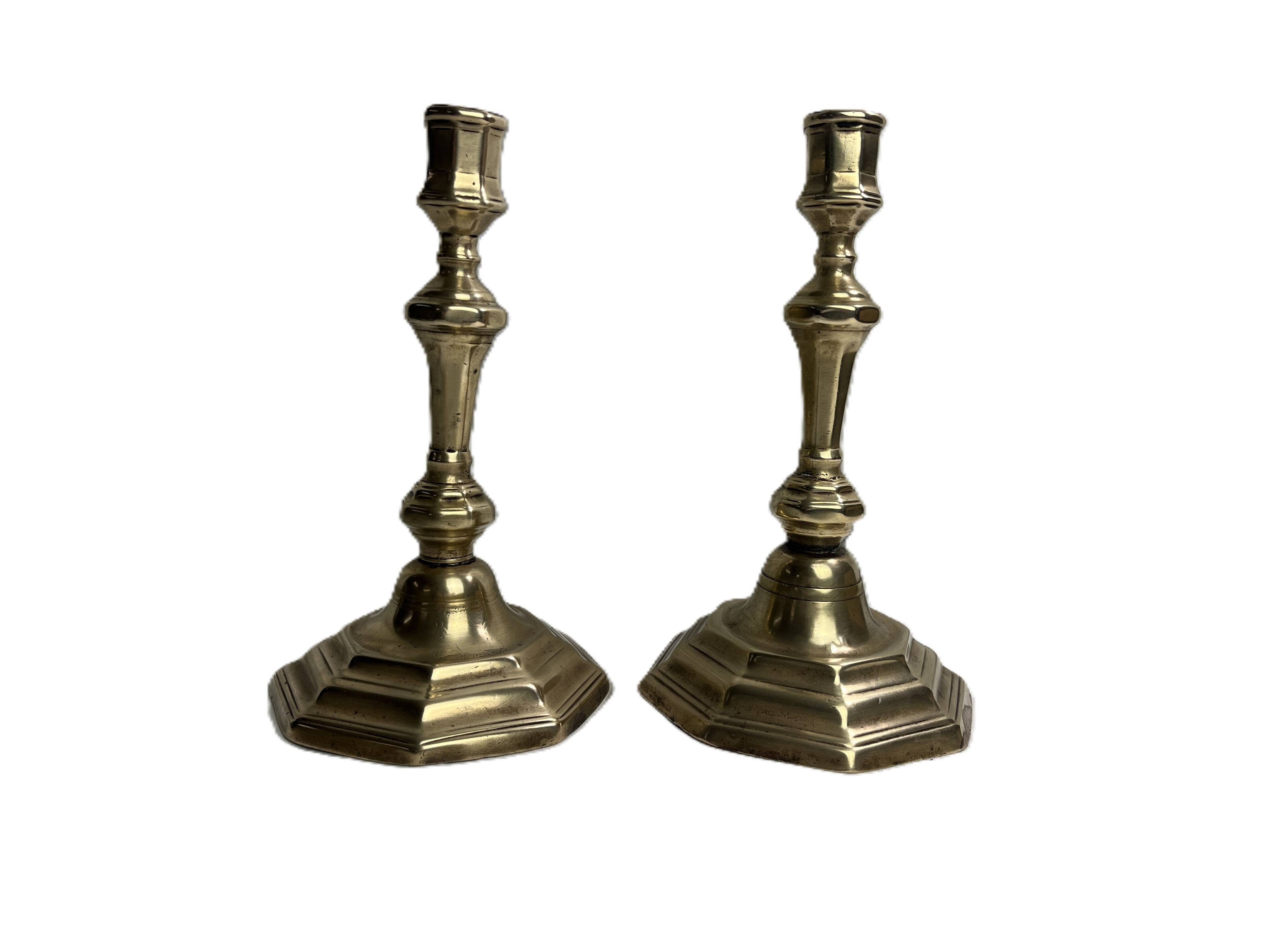 Pair of candlesticks in Louis XV style with cut corners from the early 19th century.
