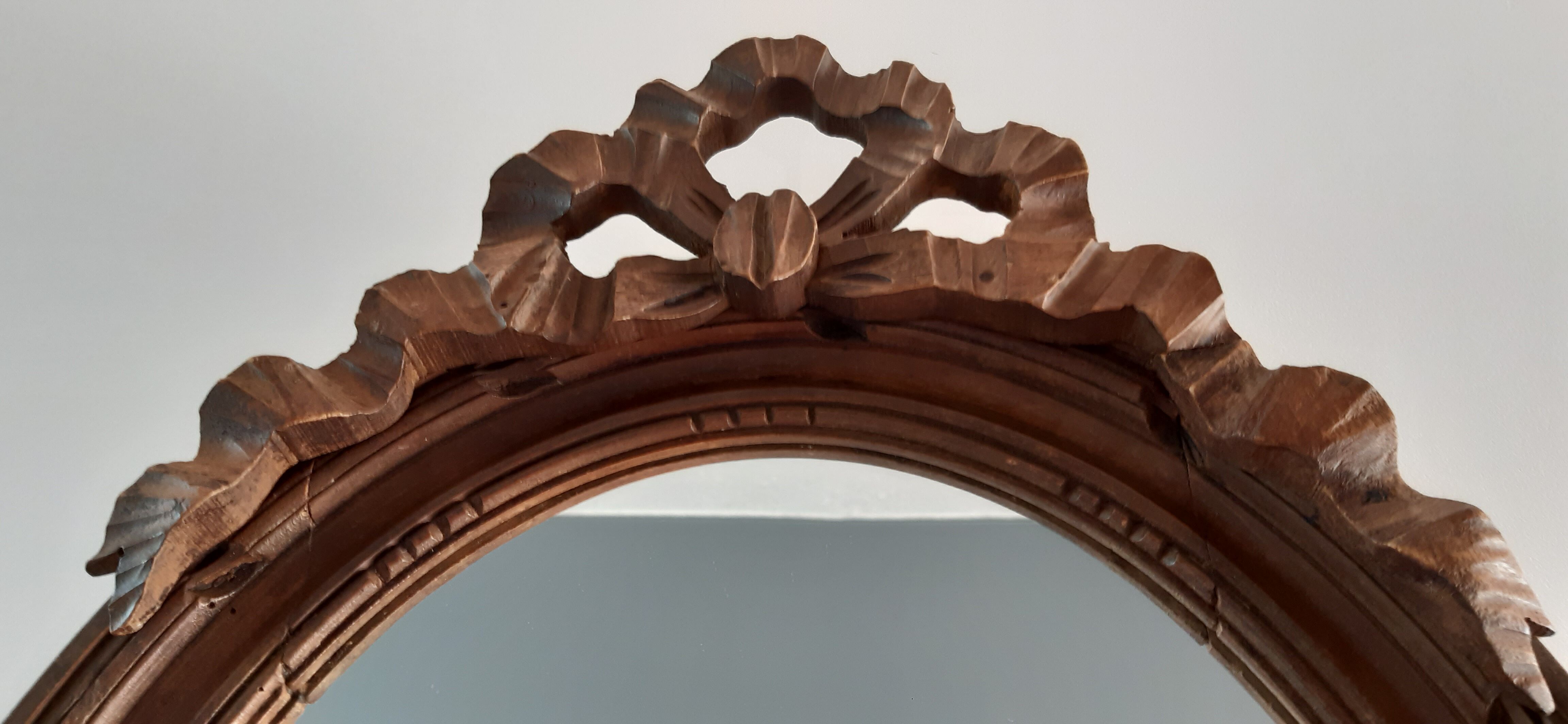 Miroir en bois oval années 30