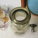 Aperitif liqueur service in iridescent glass on tray