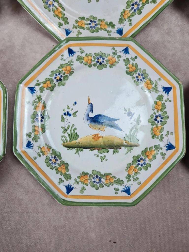 Set of 12 small antique plates by Alfred Renoleau, different designs.