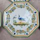 Set of 12 small antique plates by Alfred Renoleau, different designs.