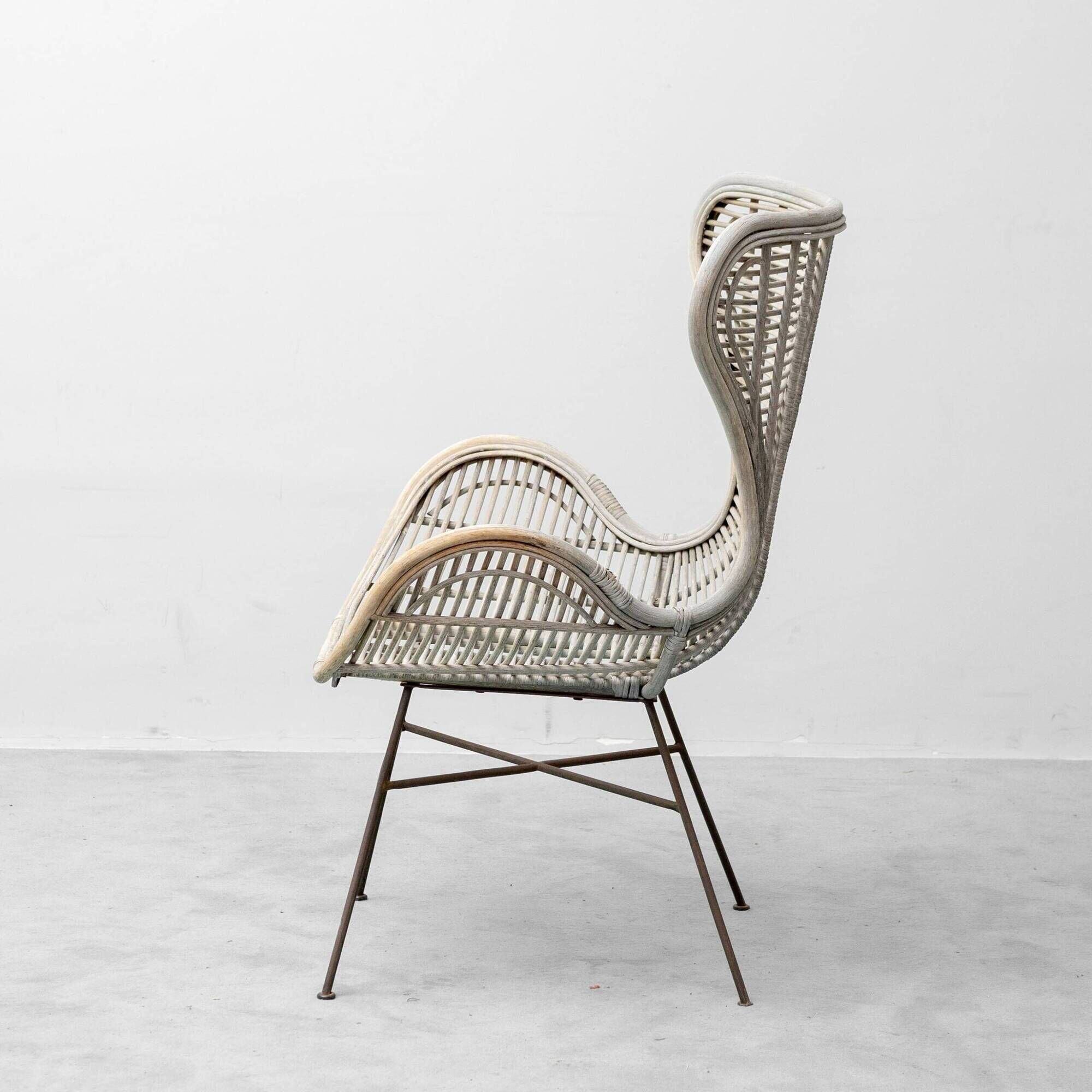 Vintage lounge armchair in rattan and metal, 1960s modernist design