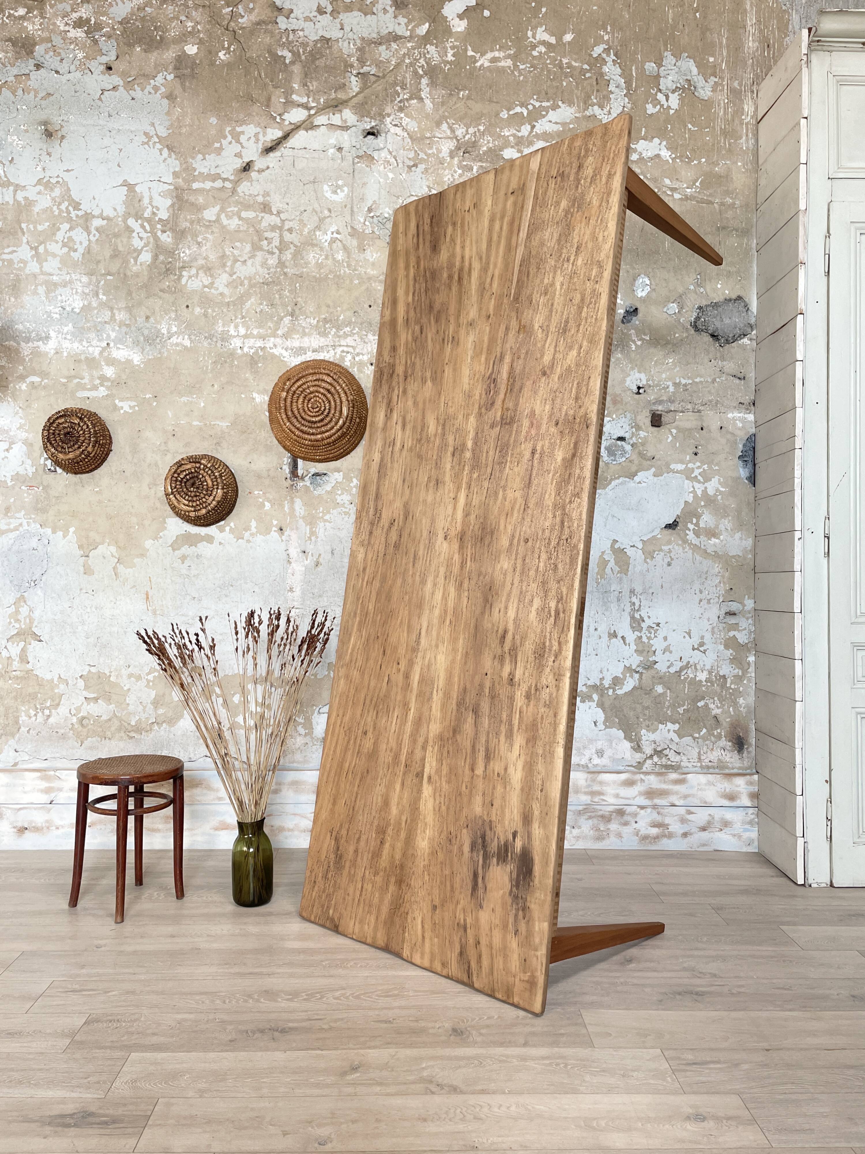 Vintage farm table with spindle legs.