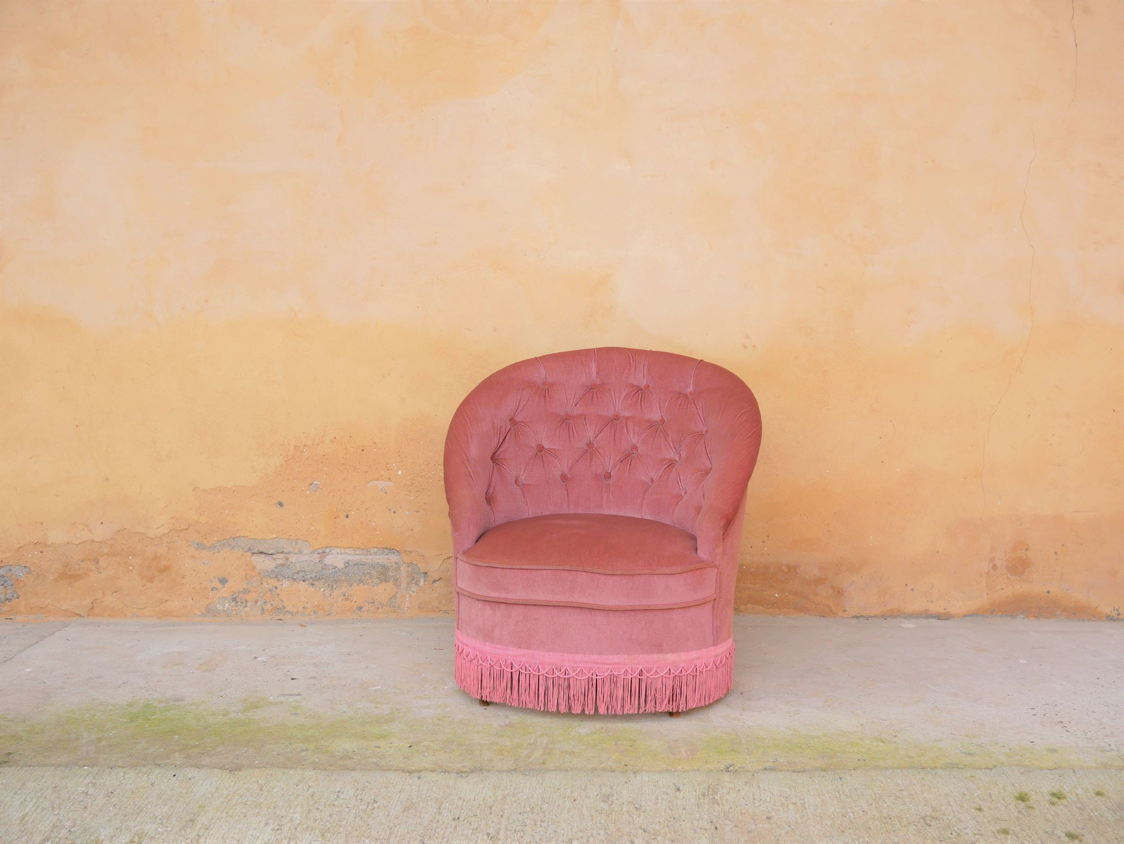 Old pink vintage padded "toad" chair