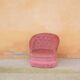 Fauteuil « crapaud » capitonné vintage vieux rose