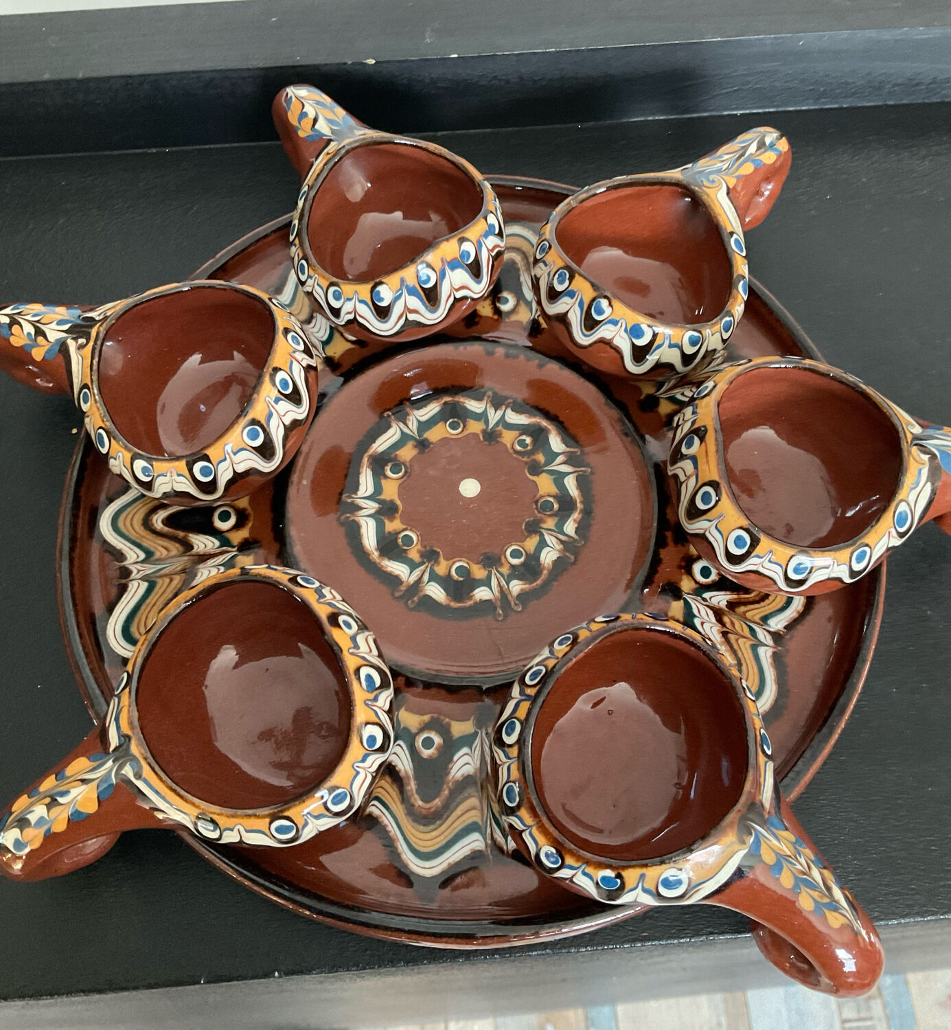 Vintage liqueur service in glazed terracotta