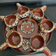 Vintage liqueur service in glazed terracotta