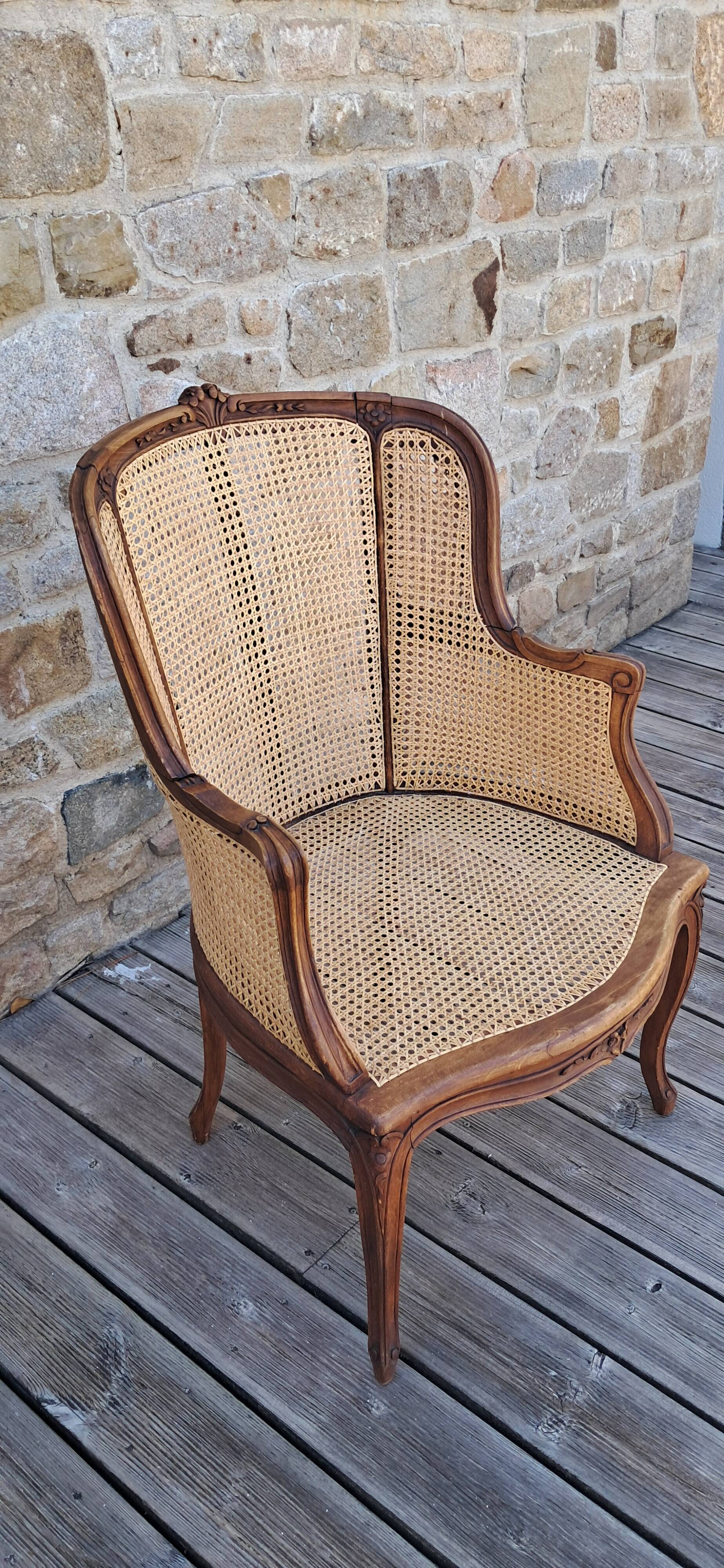 Caned armchair.