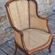 Caned armchair.