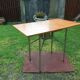 Vintage folding table with teak flaps said wallet with metal tubular base