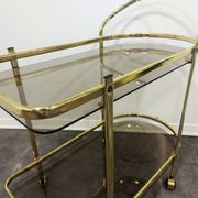 Desserte en laiton et verre fumé des années 1960