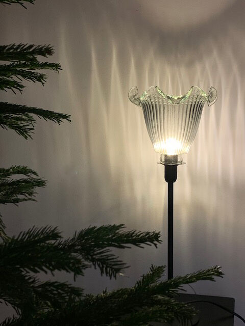 Table lamp with a vintage antique globe in ridged glass mounted on gilded stand
