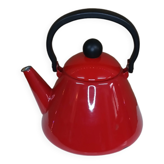 Old red enameled kettle