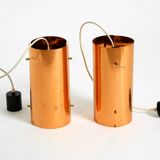 Two 50s tube pendant lamps consisting of two screwed-together copper bowls