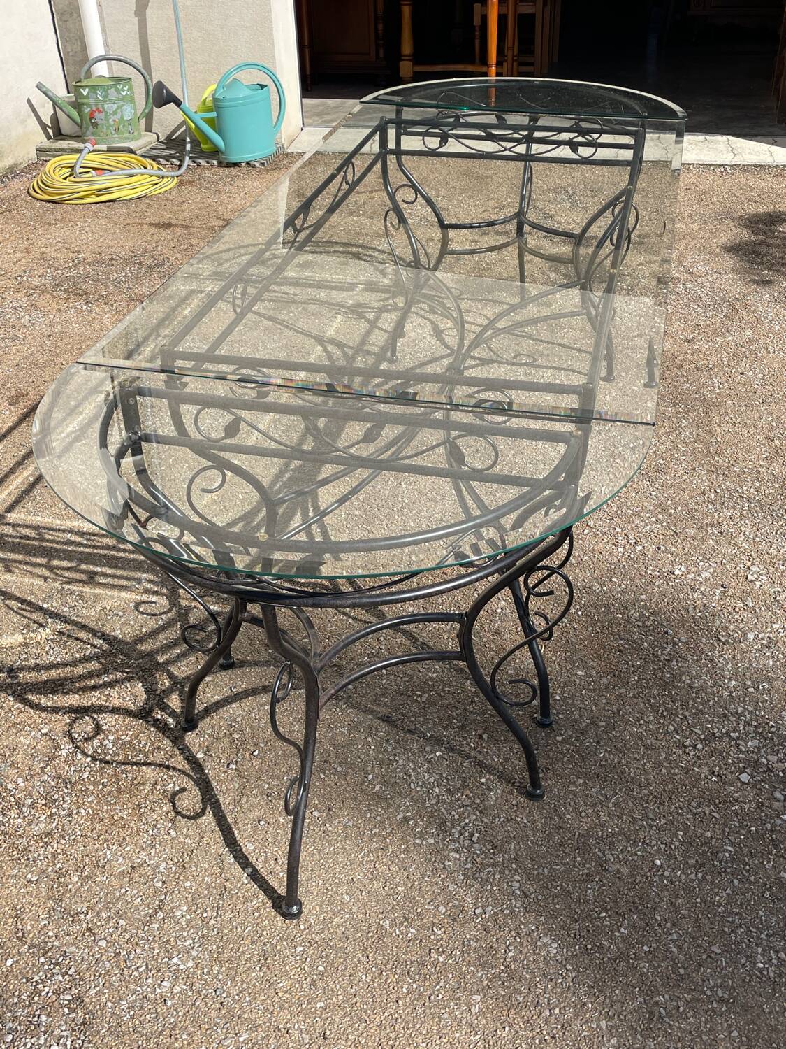 Glass and iron table with two side tables and 8 chairs
