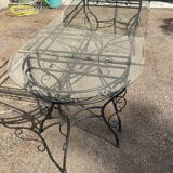 Glass and iron table with two side tables and 8 chairs